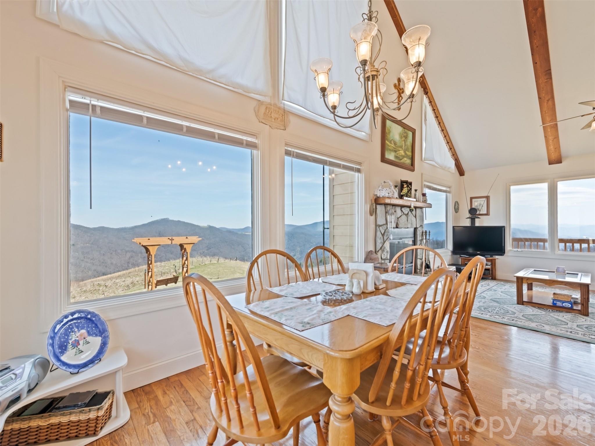 1007 Turkey Trot Road Clyde, NC 28721 - Photo 10 of 48 a dining room with furniture and a table