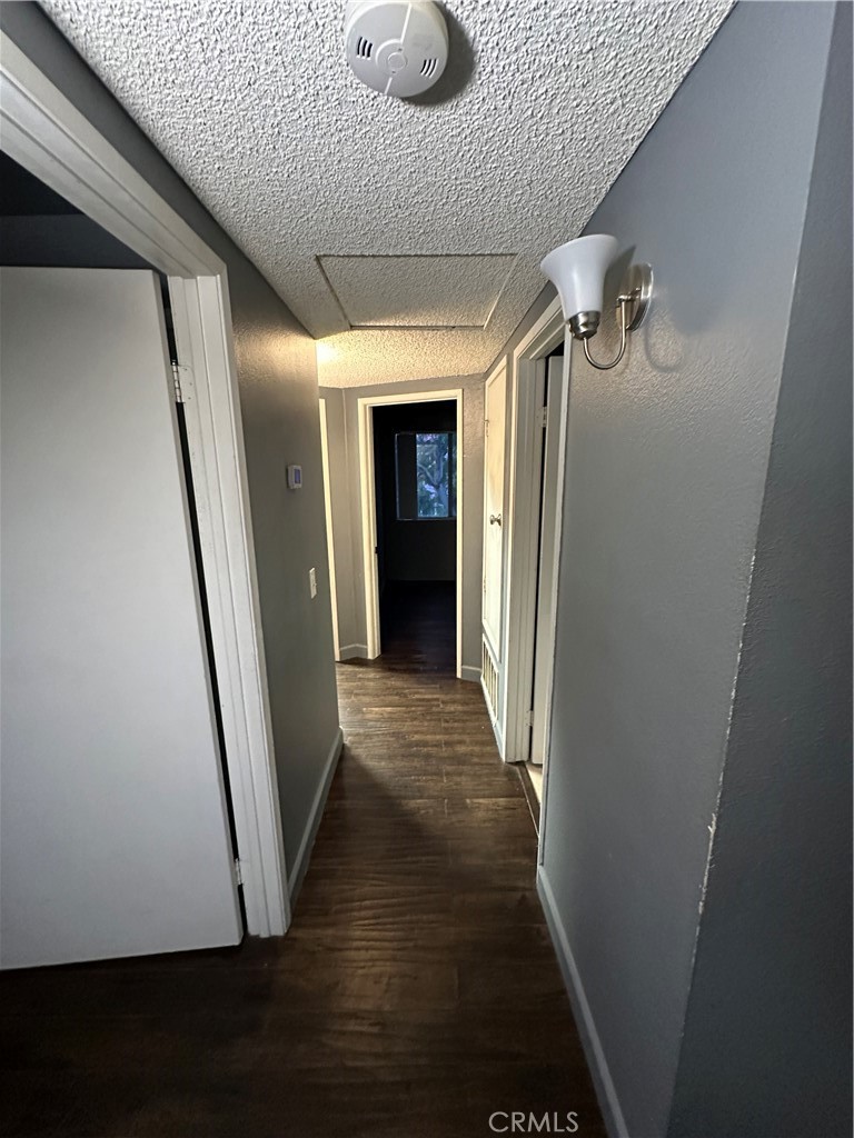 165 Racquet Club Drive Compton, CA 90220 - Photo 18 of 47 a view of a hallway