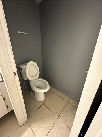 a bathroom with a toilet and a sink
