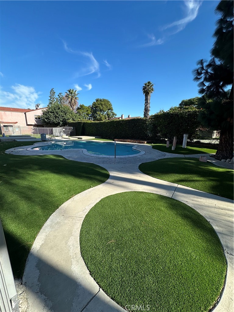 165 Racquet Club Drive Compton, CA 90220 - Photo 42 of 47 a view of a swimming pool and outdoor space