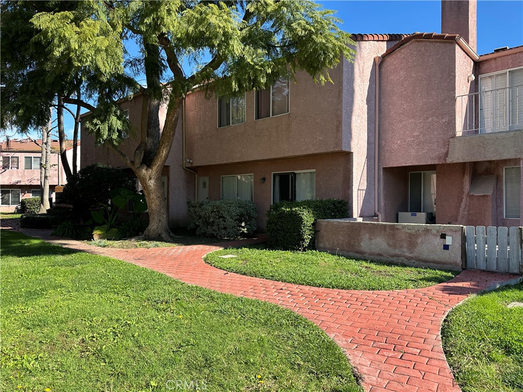 165 Racquet Club Drive Compton, CA 90220 - Photo 44 of 47 a view of a house with a yard