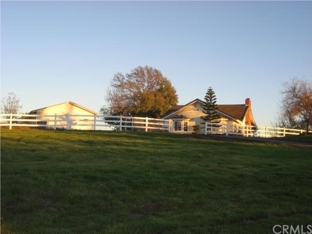 1636 McDonald Road Fallbrook, CA 92028 - Photo 1 of 1 Front of home looking up from the street