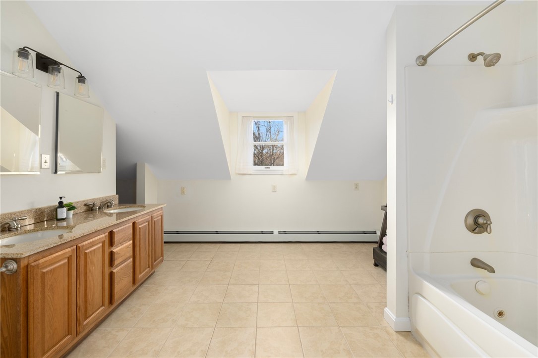 47 Sawmill Road Glocester, RI 02814 - Photo 26 of 49 Primary Bathroom with bathtub/shower and double vanity
