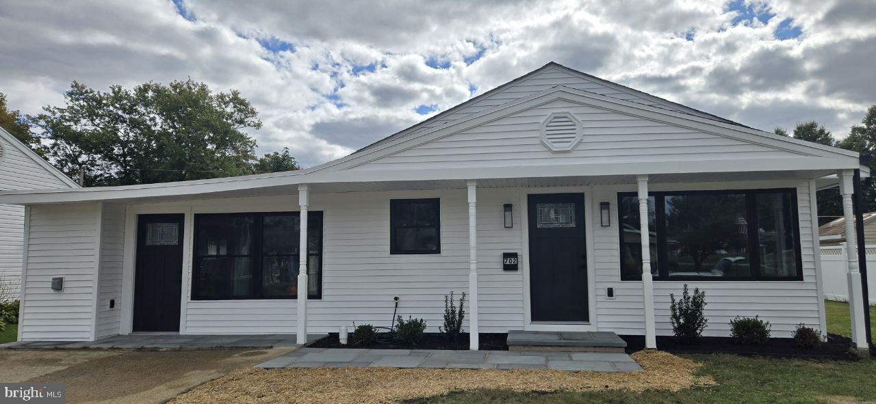 702 Beaumont Road Fairless Hills, PA 19030 - Photo 2 of 28 a front view of a house with garden