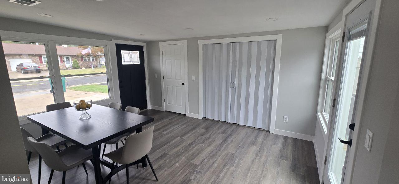 702 Beaumont Road Fairless Hills, PA 19030 - Photo 26 of 28 a view of a dining room with furniture window and wooden floor