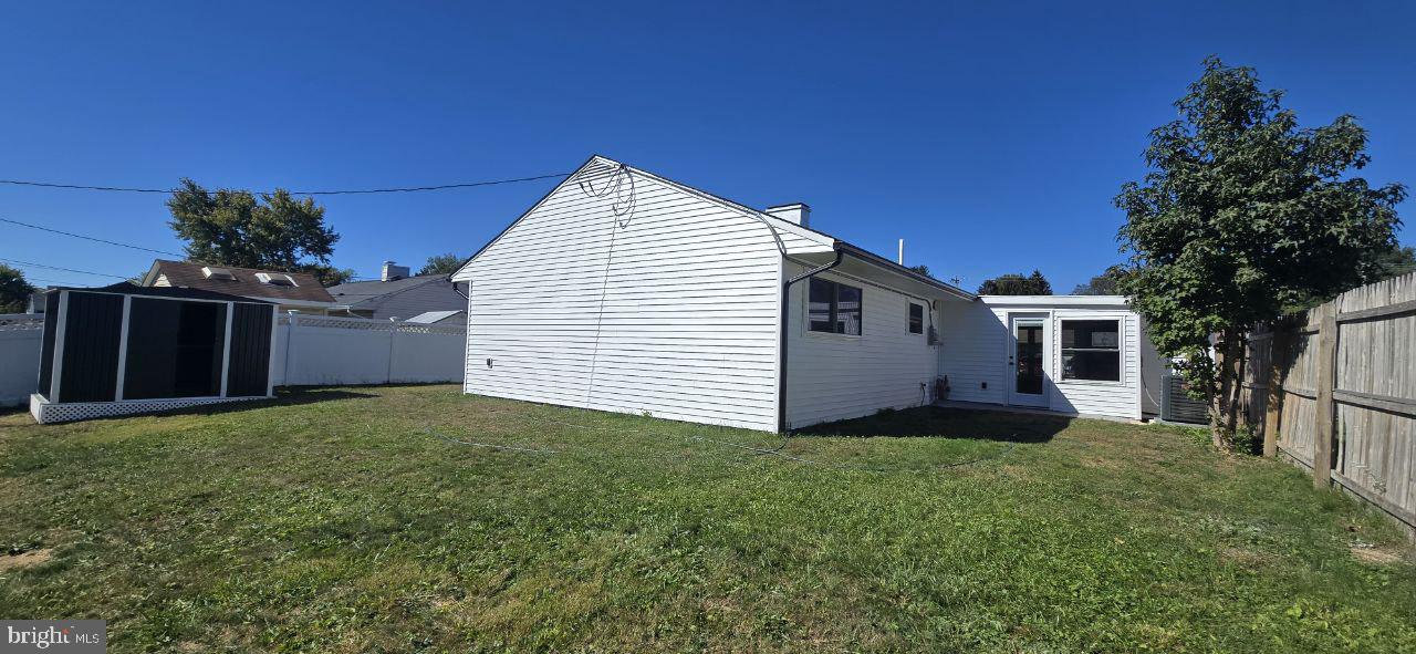 702 Beaumont Road Fairless Hills, PA 19030 - Photo 8 of 28 a view of a backyard of the house