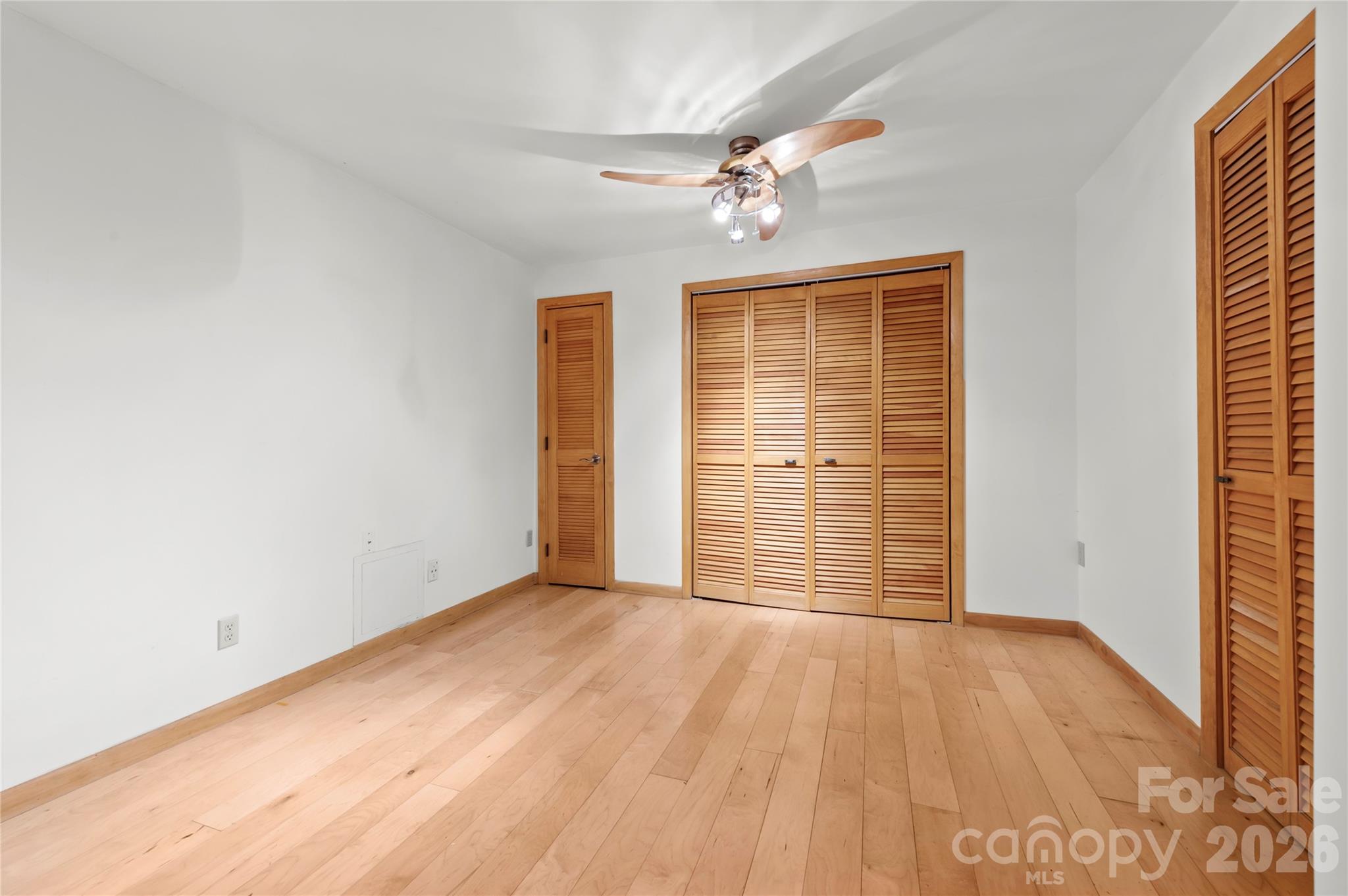 1483 Old Fort Road Fairview, NC 28730 - Photo 20 of 29 a view of an empty room with wooden floor