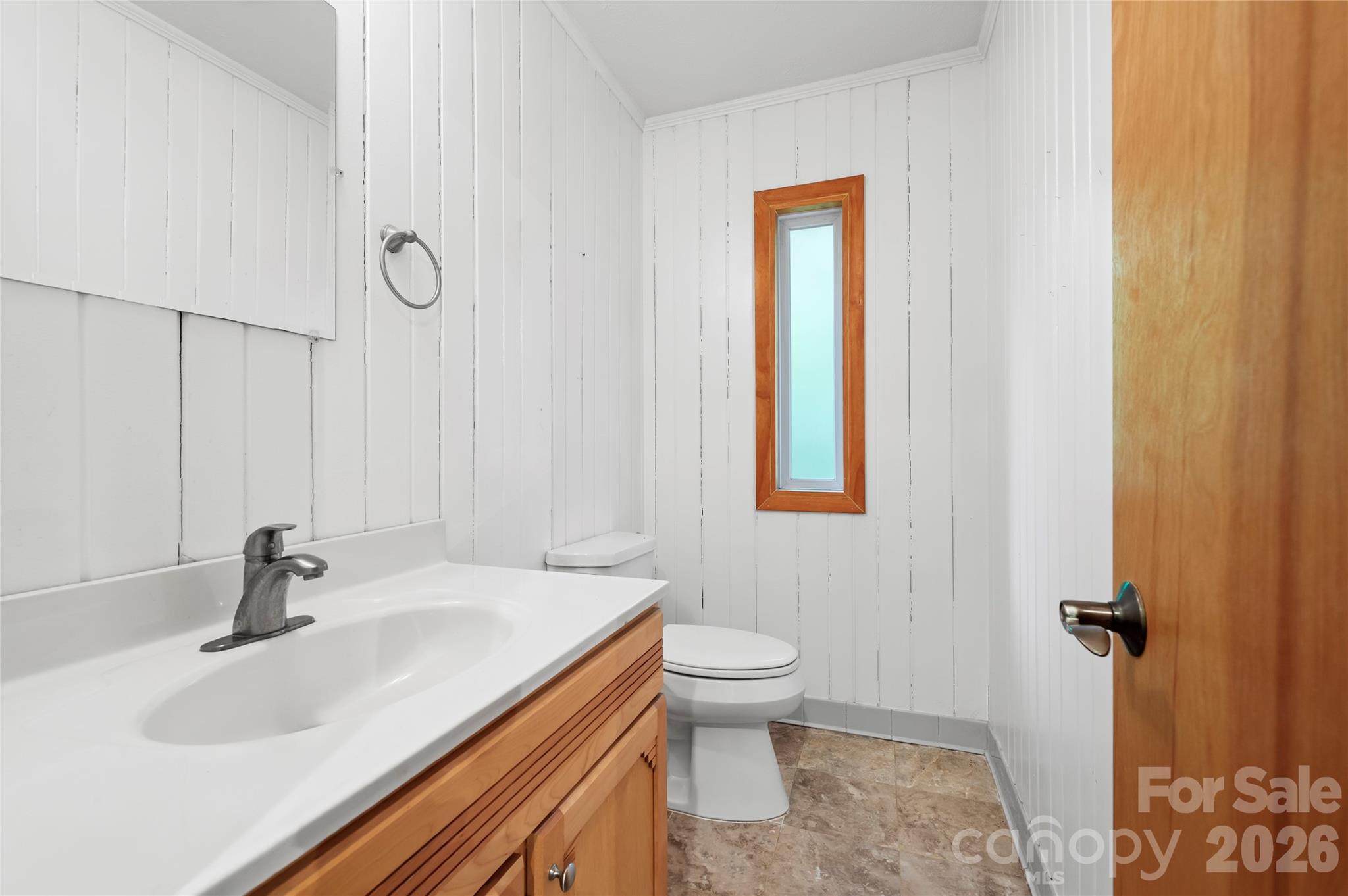1483 Old Fort Road Fairview, NC 28730 - Photo 21 of 29 a bathroom with a sink and a mirror