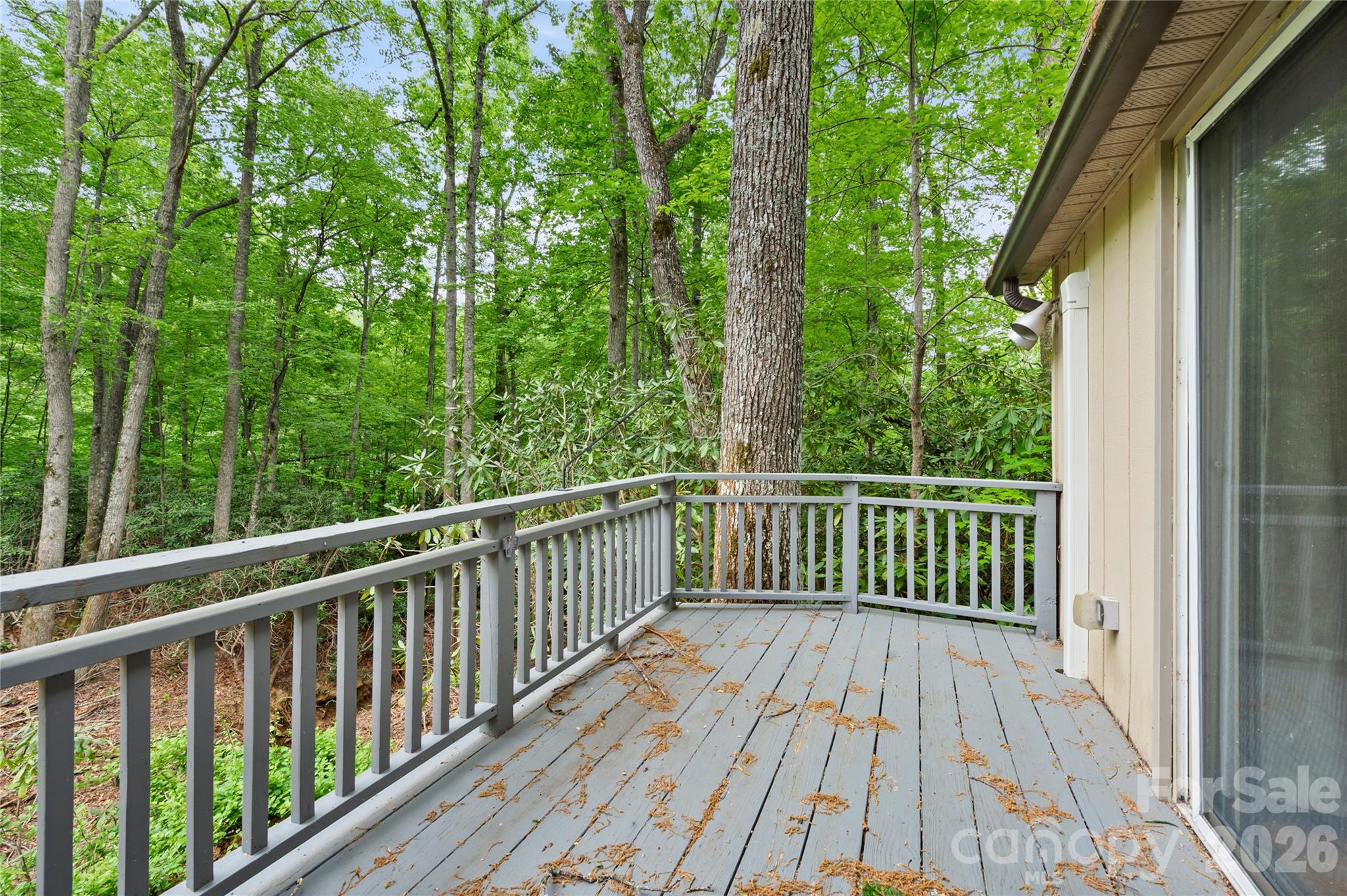 1483 Old Fort Road Fairview, NC 28730 - Photo 25 of 29 a view of a wooden deck with a trees