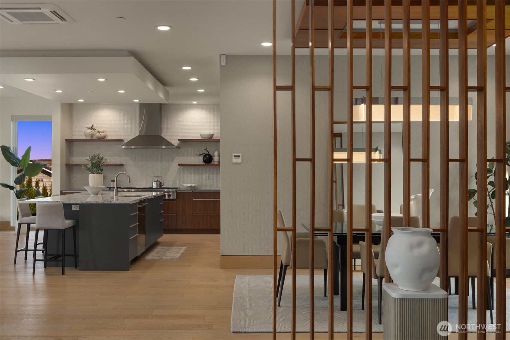 8926 Northeast 36th Street Yarrow Point, WA 98004 - Photo 11 of 40 a kitchen with kitchen island granite countertop lots of counter top space and stainless steel appliances