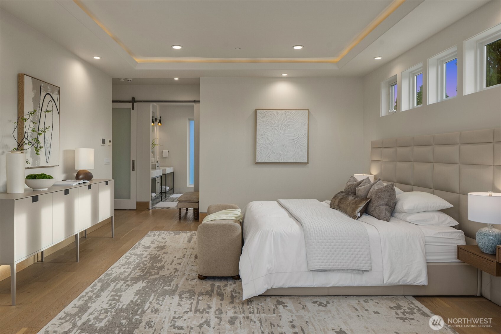 8926 Northeast 36th Street Yarrow Point, WA 98004 - Photo 15 of 40 a bedroom with a bed and a couch