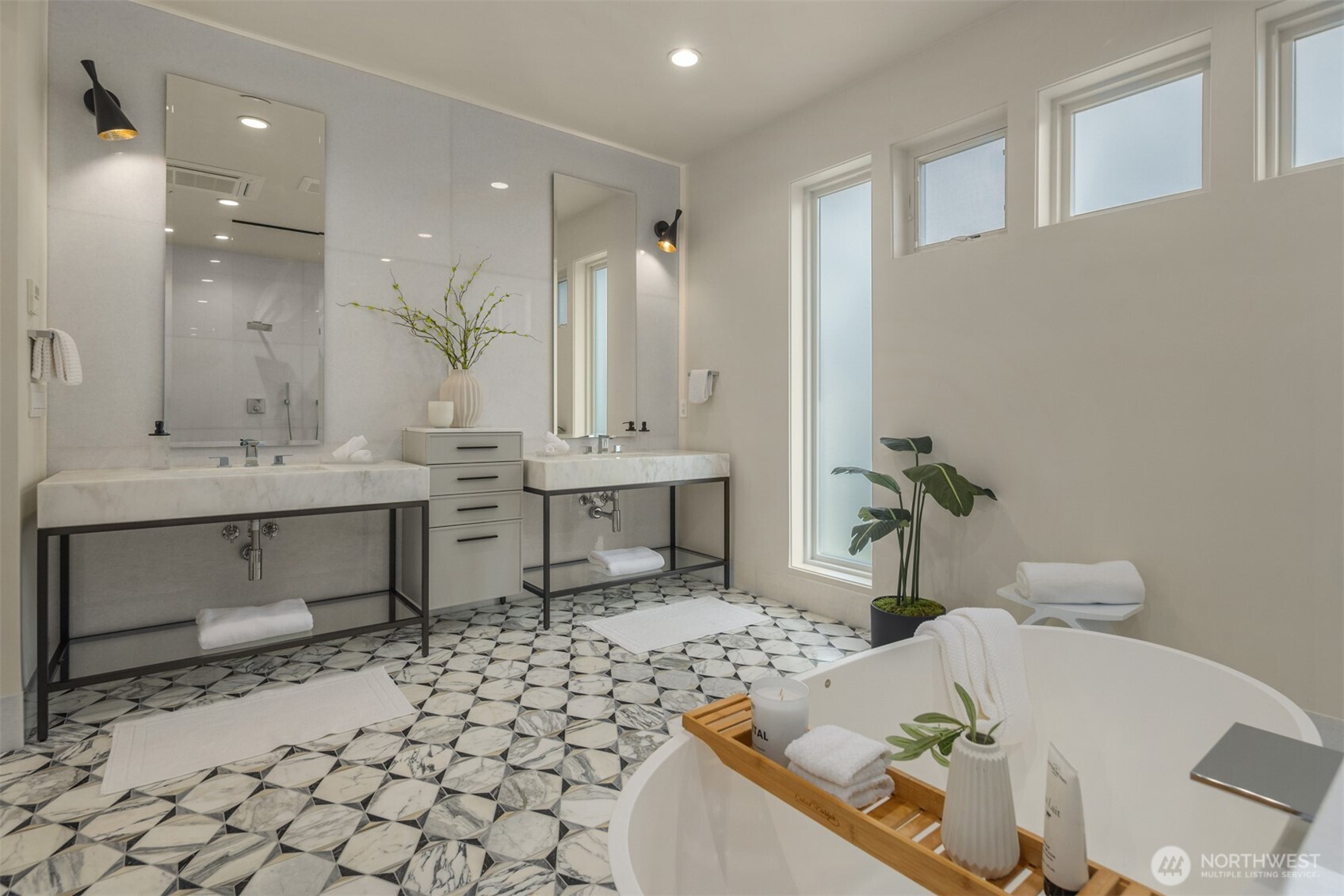 8926 Northeast 36th Street Yarrow Point, WA 98004 - Photo 17 of 40 a bathroom with a sink mirror toilet and bathtub