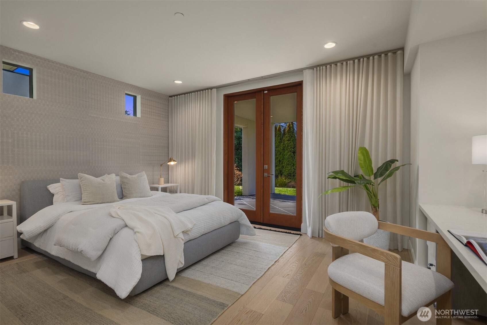 8926 Northeast 36th Street Yarrow Point, WA 98004 - Photo 29 of 40 a bedroom with a bed and a couch