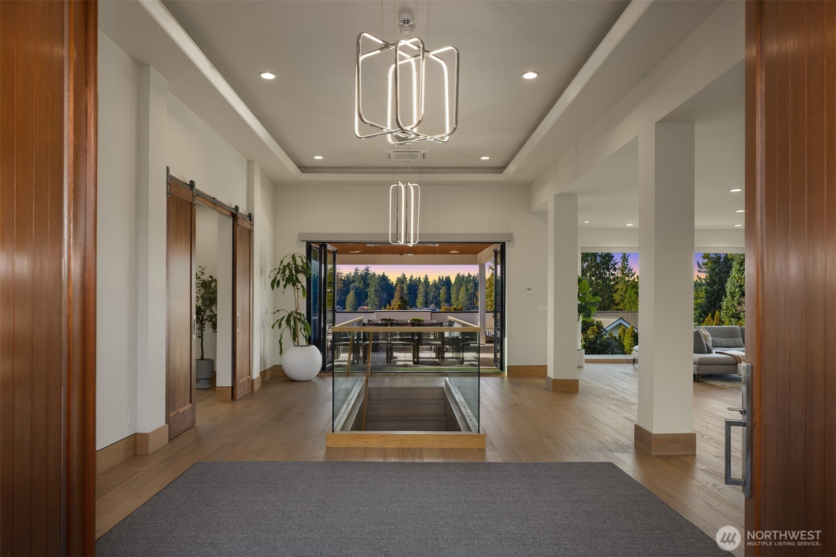 8926 Northeast 36th Street Yarrow Point, WA 98004 - Photo 3 of 40 a view of hall way with furniture and chandelier