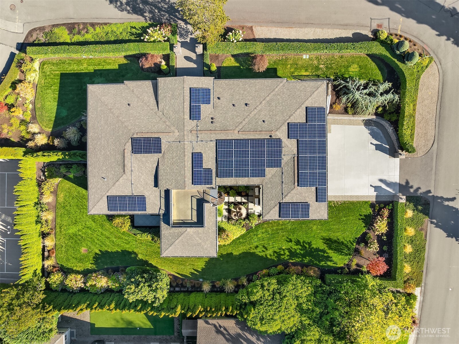 8926 Northeast 36th Street Yarrow Point, WA 98004 - Photo 40 of 40 an aerial view of a house with a garden and plants