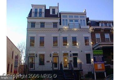 2434 Ontario Road Northwest, Unit 2 Washington, DC 20009 - Photo 1 of 27 a front view of a building with glass windows