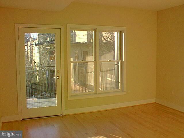 2434 Ontario Road Northwest, Unit 2 Washington, DC 20009 - Photo 23 of 27 a view of an empty room with window
