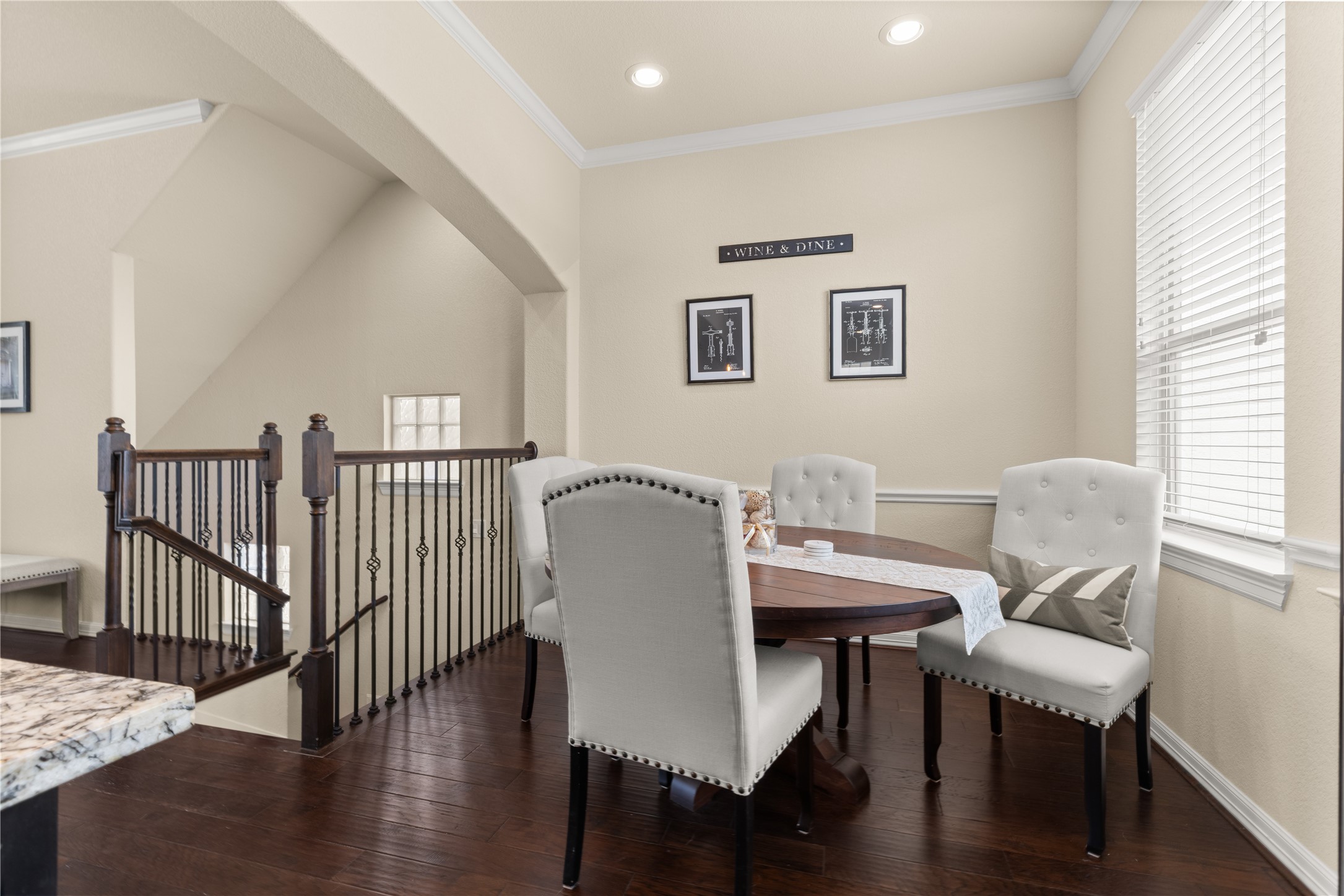 10204 Spring Shadows Park Circle Houston, TX 77080 - Photo 16 of 48 a view of a dining room with furniture and wooden floor