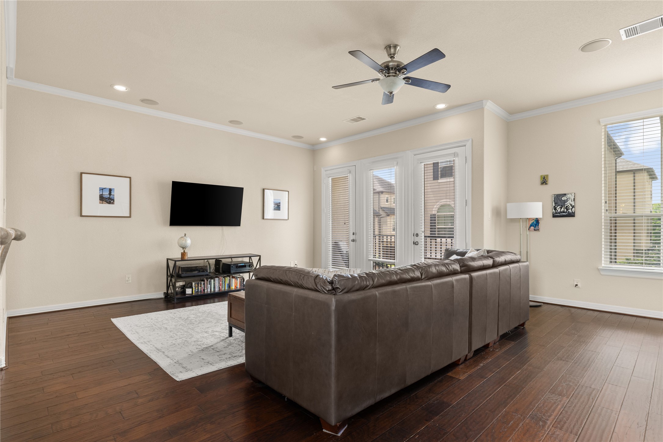10204 Spring Shadows Park Circle Houston, TX 77080 - Photo 17 of 48 a living room with furniture and a flat screen tv
