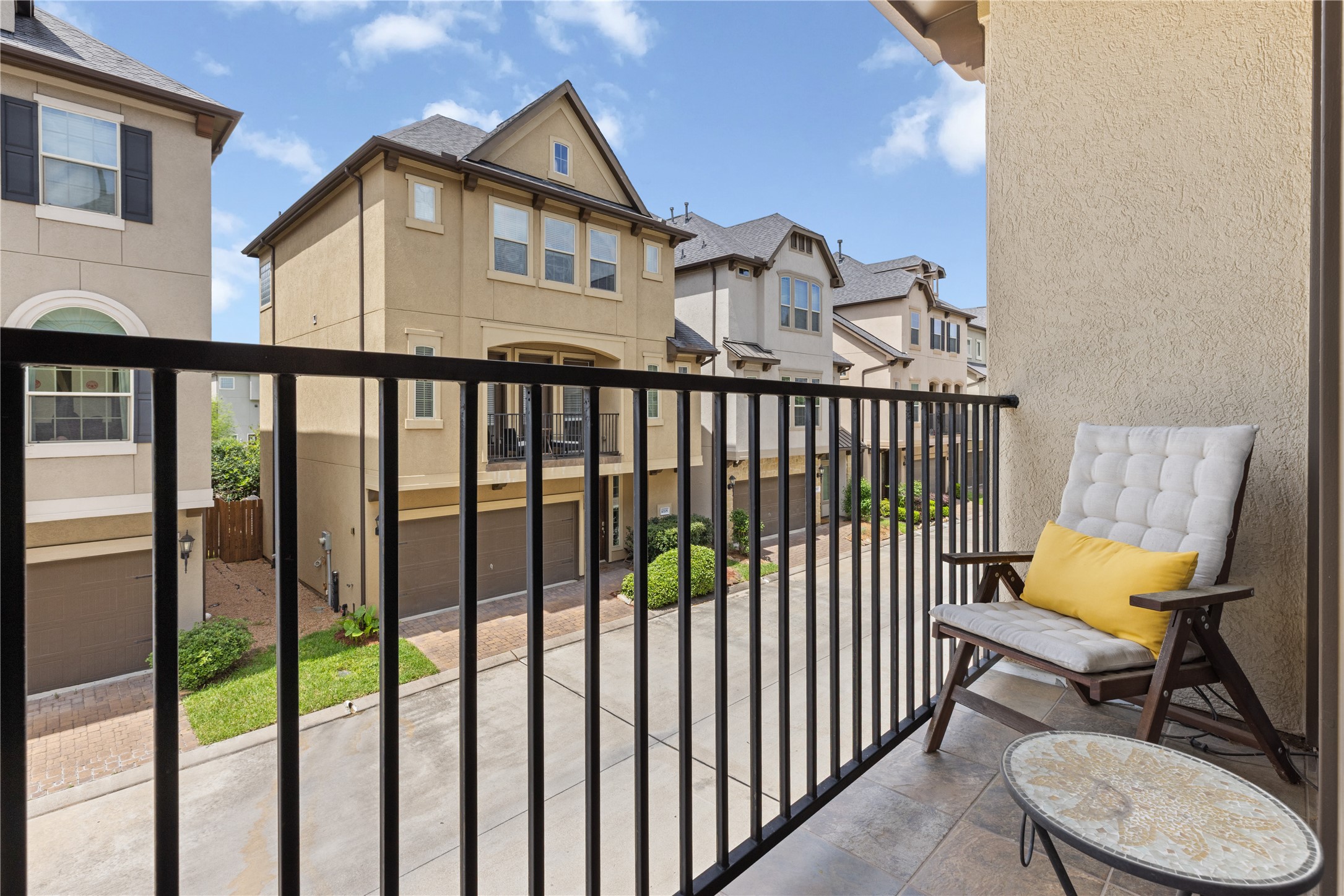 10204 Spring Shadows Park Circle Houston, TX 77080 - Photo 21 of 48 a view of a chair and table in the balcony