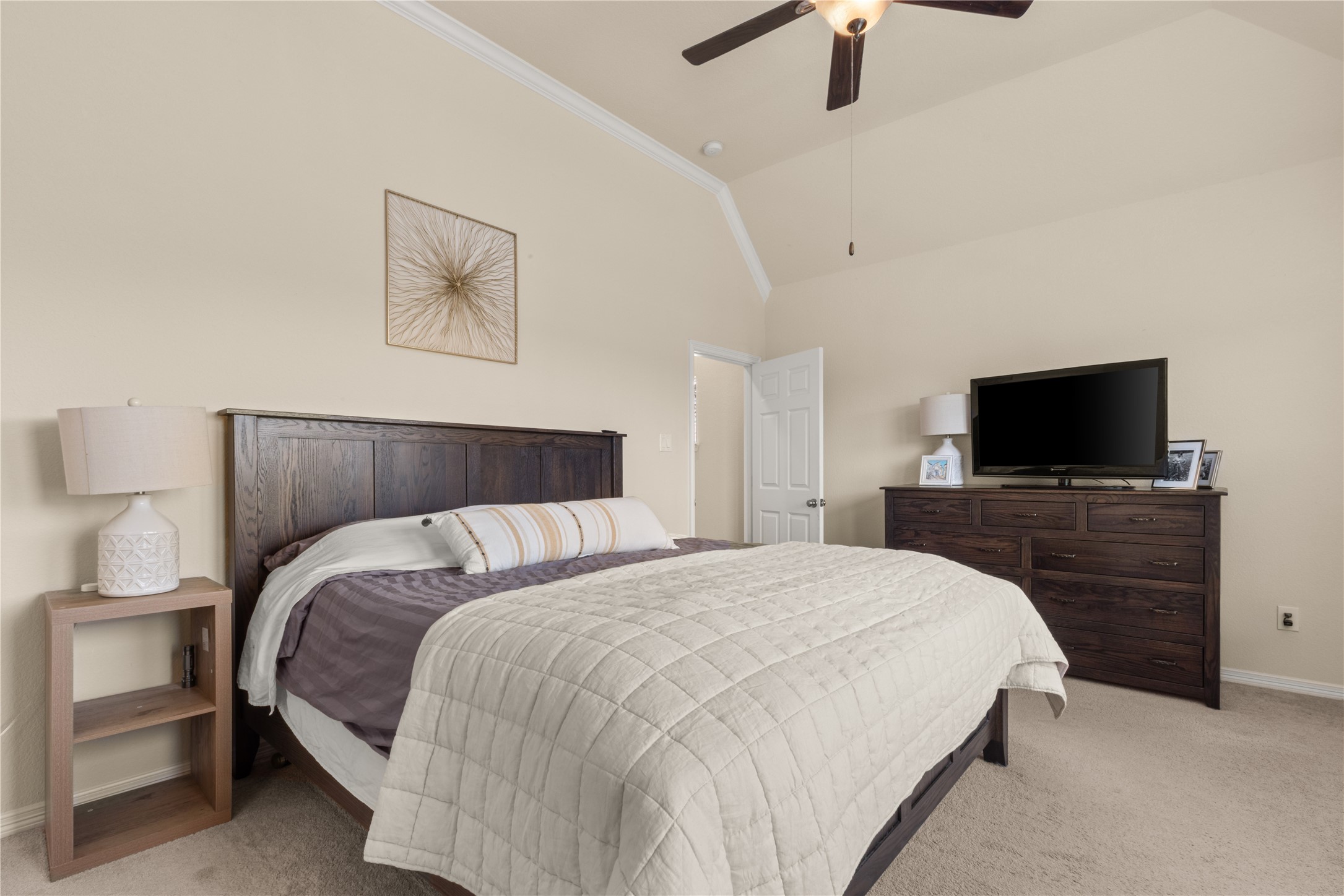10204 Spring Shadows Park Circle Houston, TX 77080 - Photo 24 of 48 a bedroom with a bed and a flat screen tv