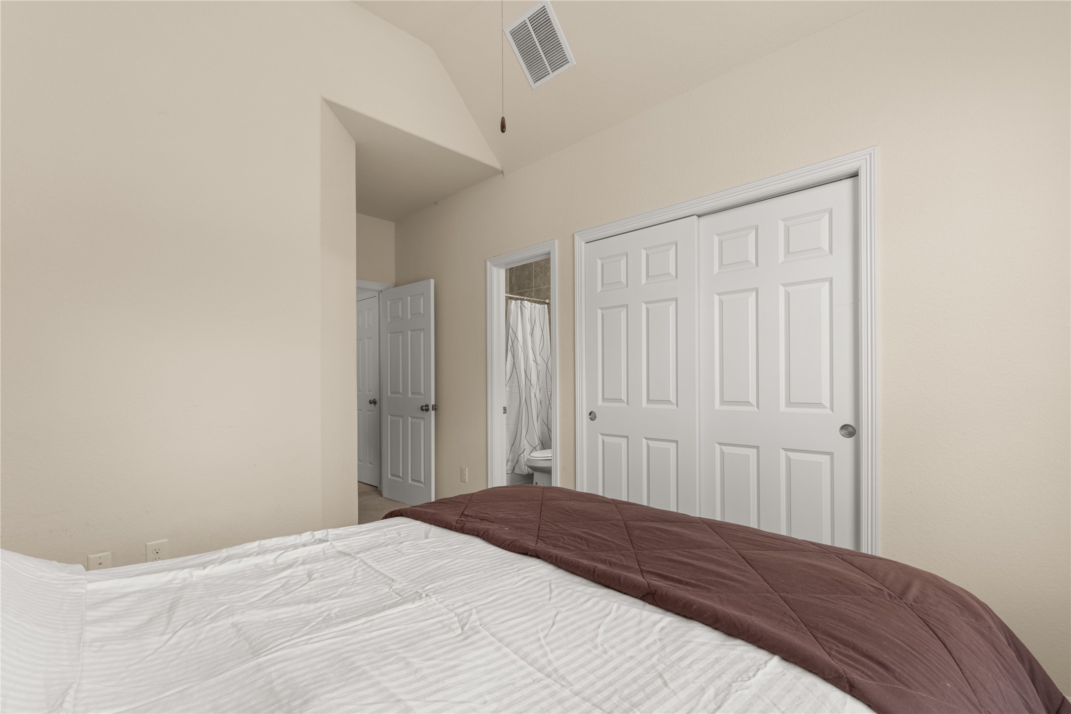 10204 Spring Shadows Park Circle Houston, TX 77080 - Photo 34 of 48 a bedroom with a bed and cabinets