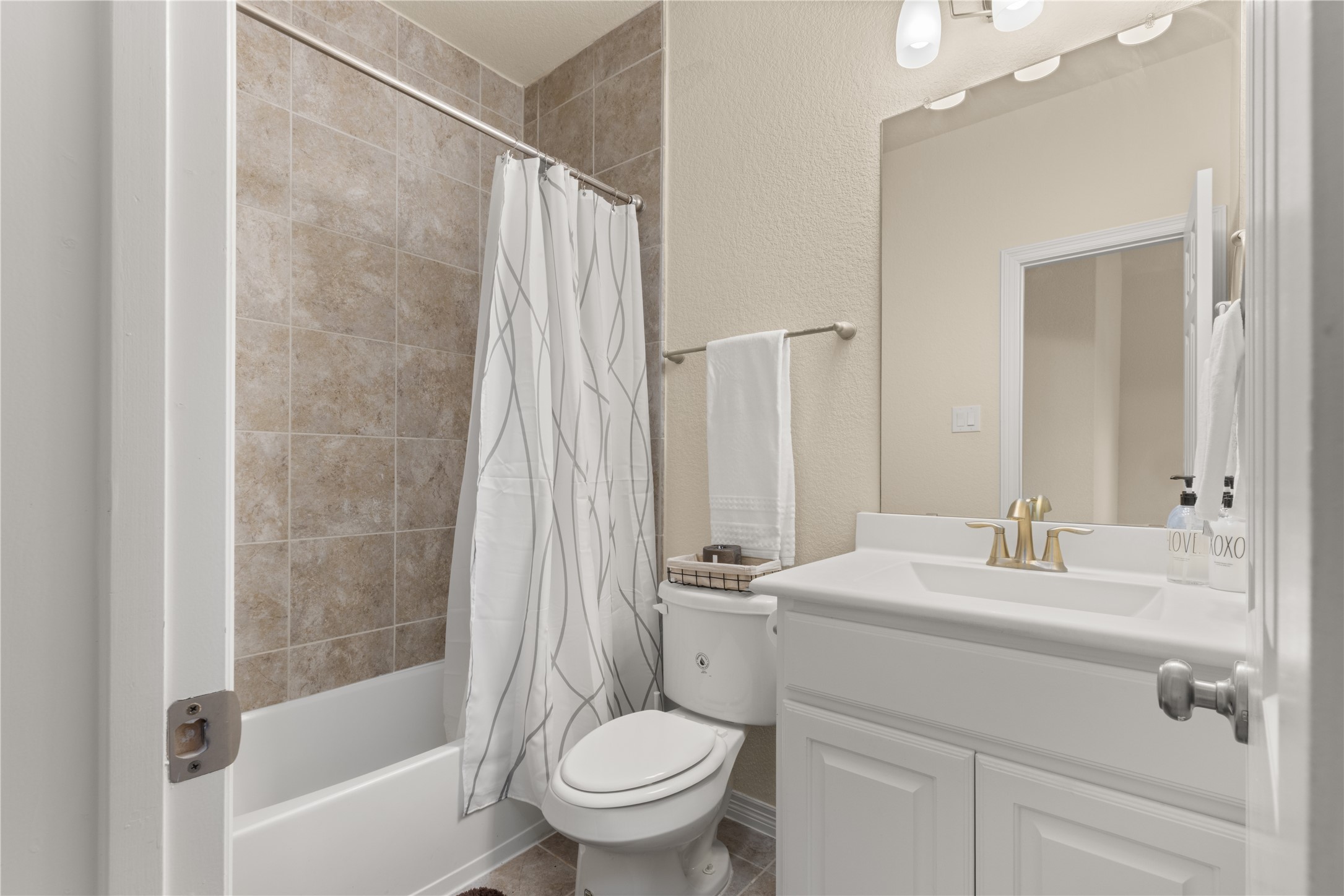 10204 Spring Shadows Park Circle Houston, TX 77080 - Photo 35 of 48 a bathroom with a sink toilet and shower