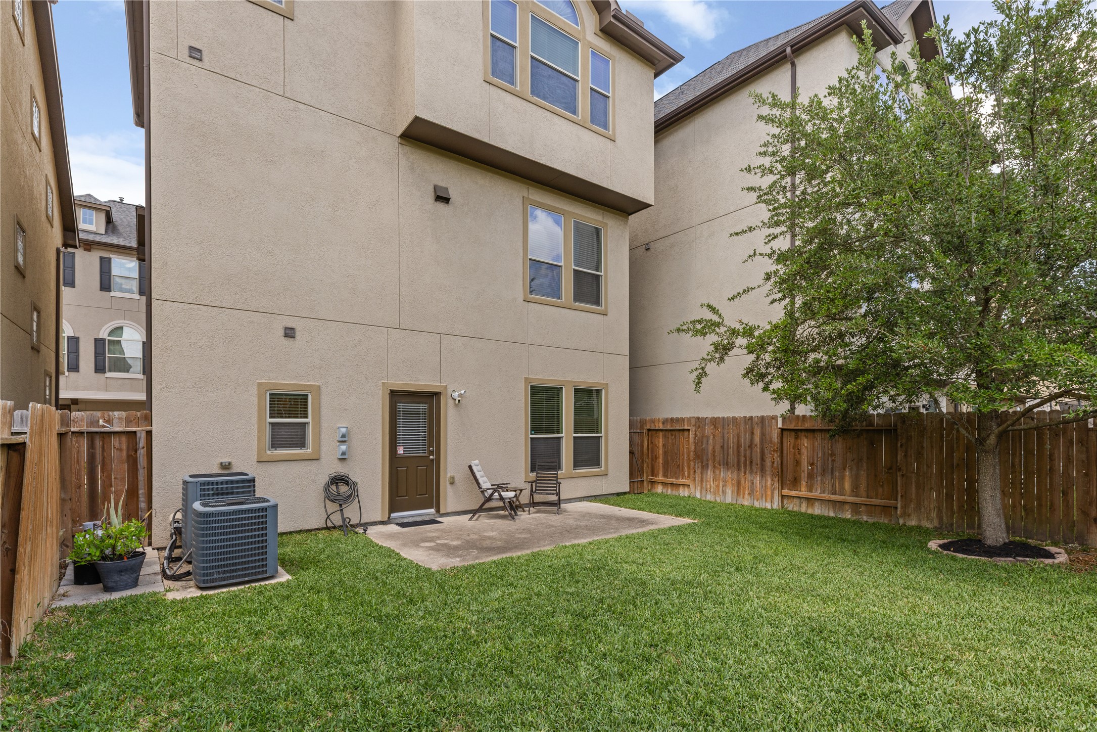 10204 Spring Shadows Park Circle Houston, TX 77080 - Photo 37 of 48 a view of a house with backyard porch and sitting area