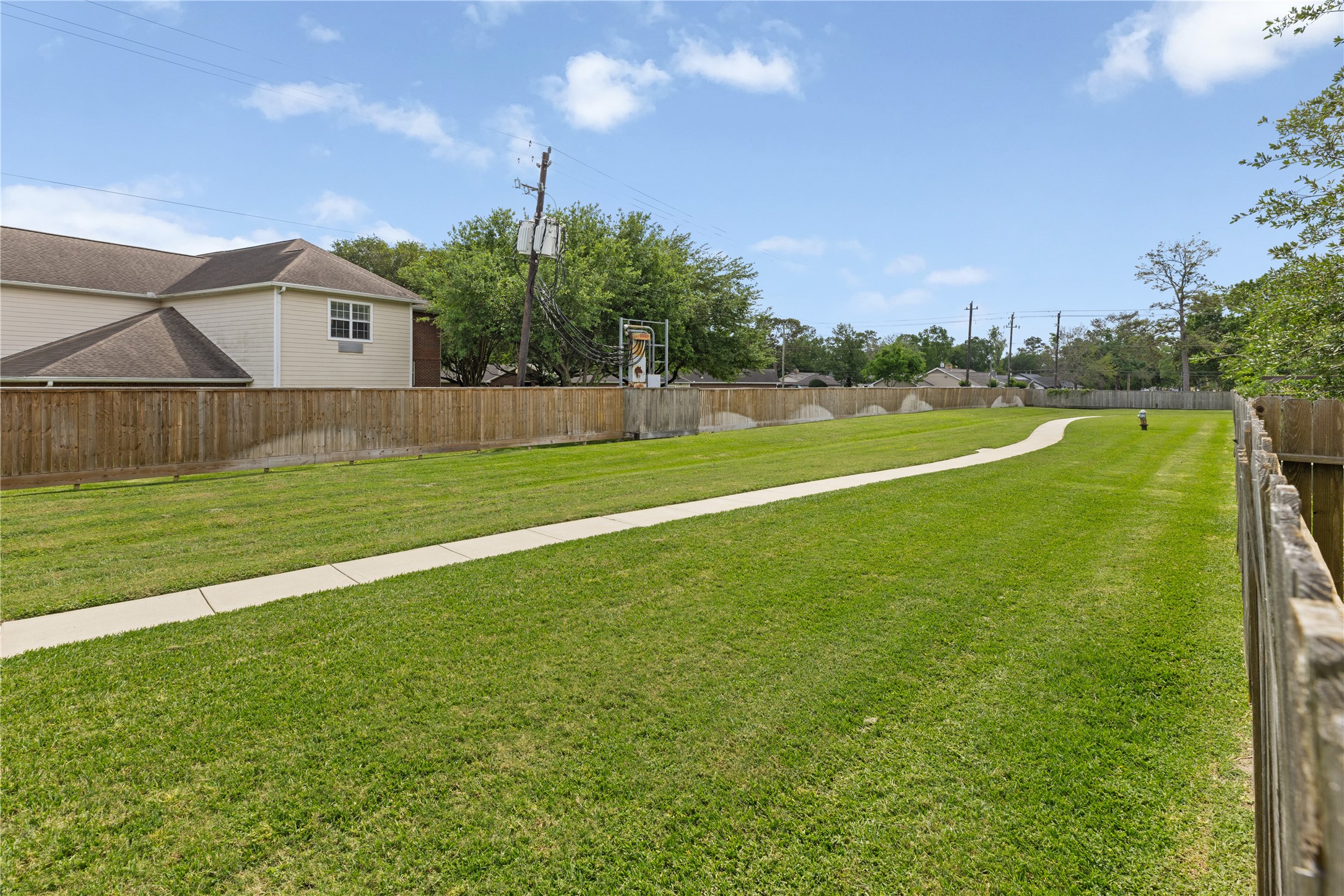 10204 Spring Shadows Park Circle Houston, TX 77080 - Photo 44 of 48 a view of a house with a big yard