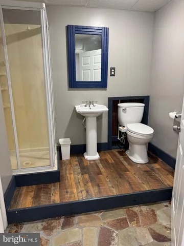 a bathroom with a sink and a toilet