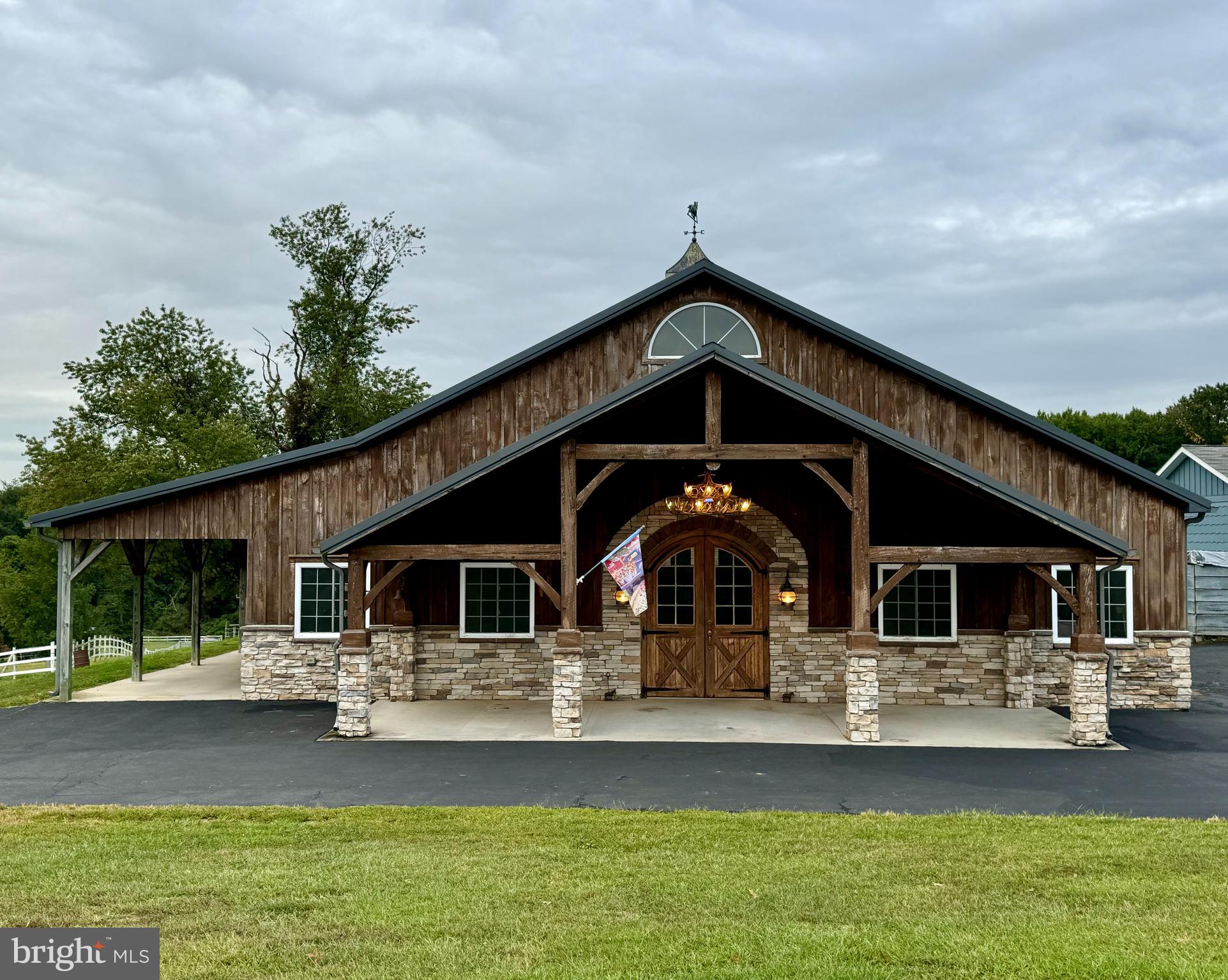 1089 Pond Neck Road Earleville, MD 21919 - Photo 19 of 34 a front view of a house with garden