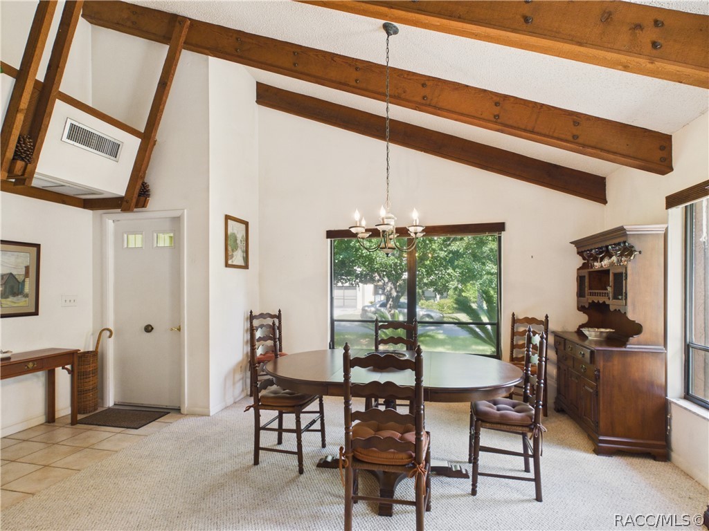 5 Pinewood Green Homosassa, FL 34446 - Photo 4 of 44 FOYER WITH DINING ROOM AREA LEFT