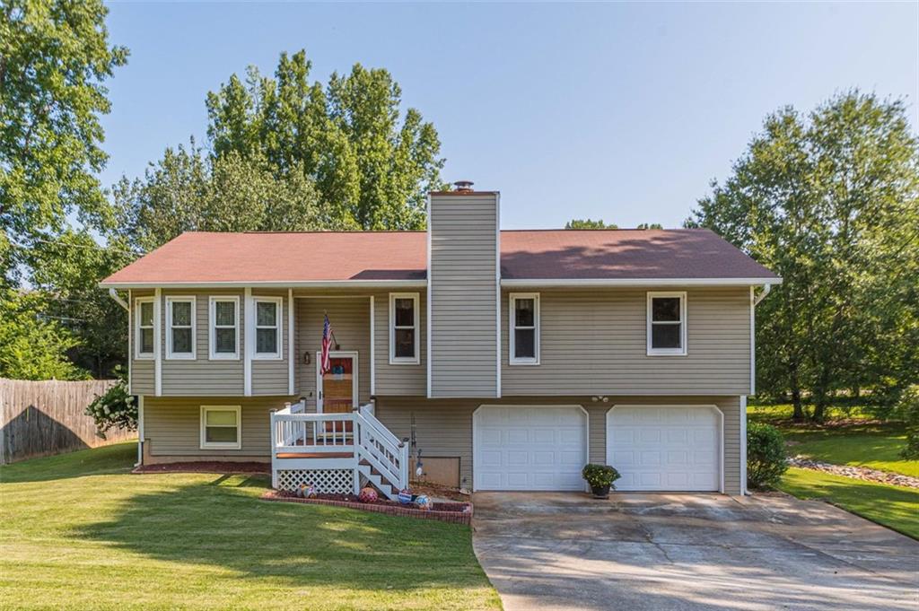 748 Ralph Road Southeast Conyers, GA 30094 - Photo 1 of 1 a front view of house with yard