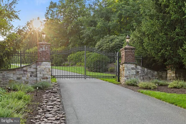 a view of a livingroom with furniture and a chandelier