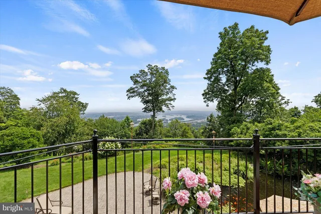 a spacious bedroom with two beds and a large window