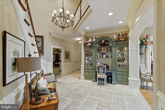 an aerial view of a house with garden space and street view