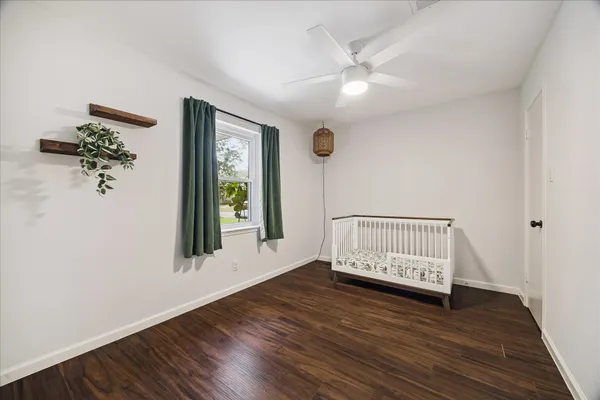 a view of entryway with wooden floor