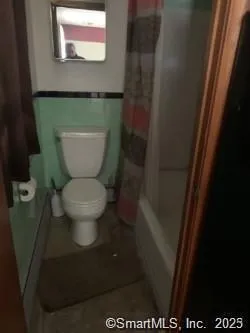 a bathroom with a toilet