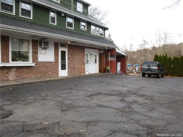 a car parked in front of a building