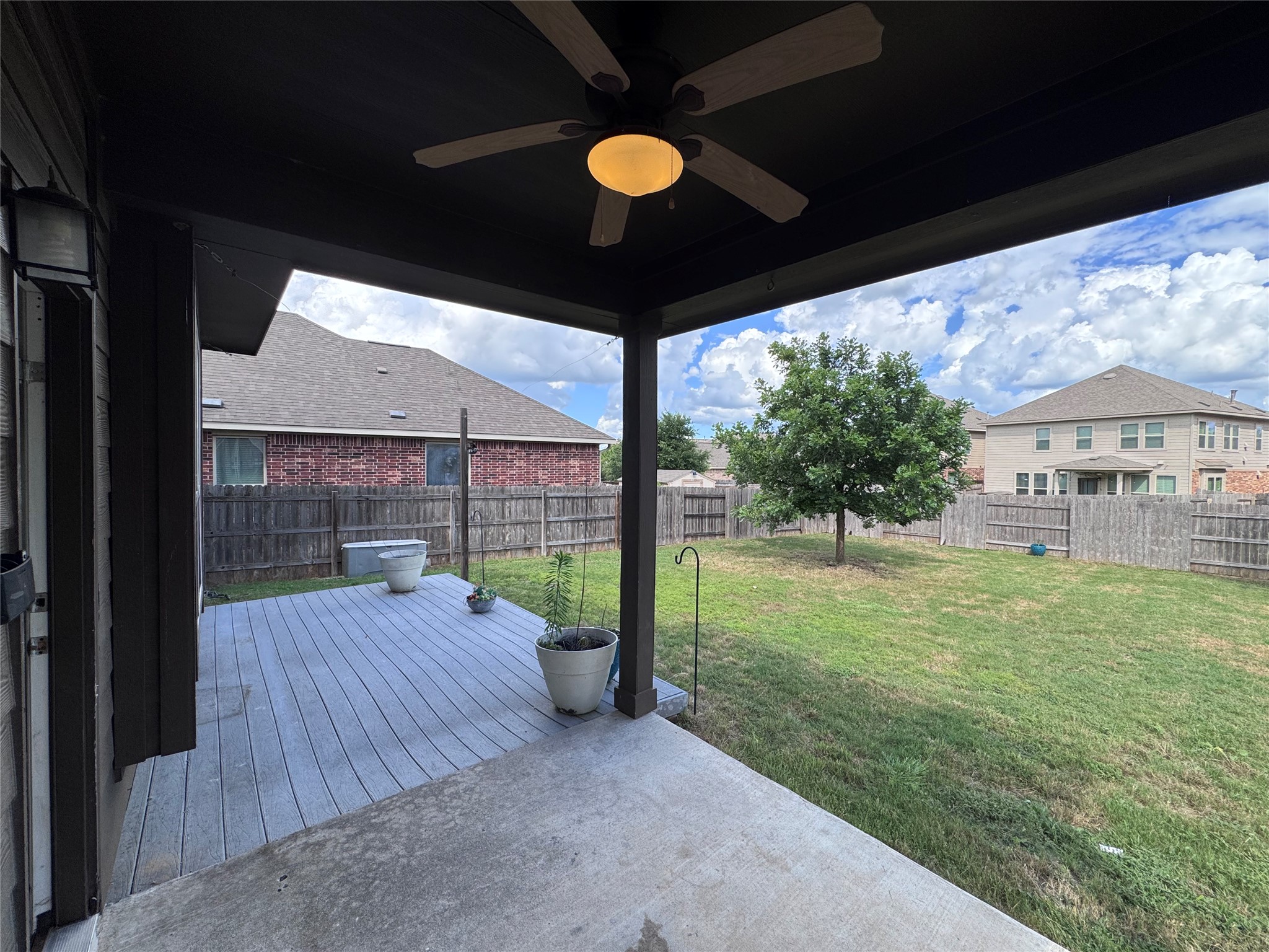 2605 Rough Berry Road Pflugerville, TX 78660 - Photo 38 of 40 Enjoy outdoor living on this shaded porch overlooking a spacious fenced yard.