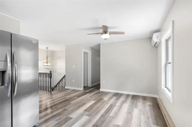 a view of a hallway with a chandelier