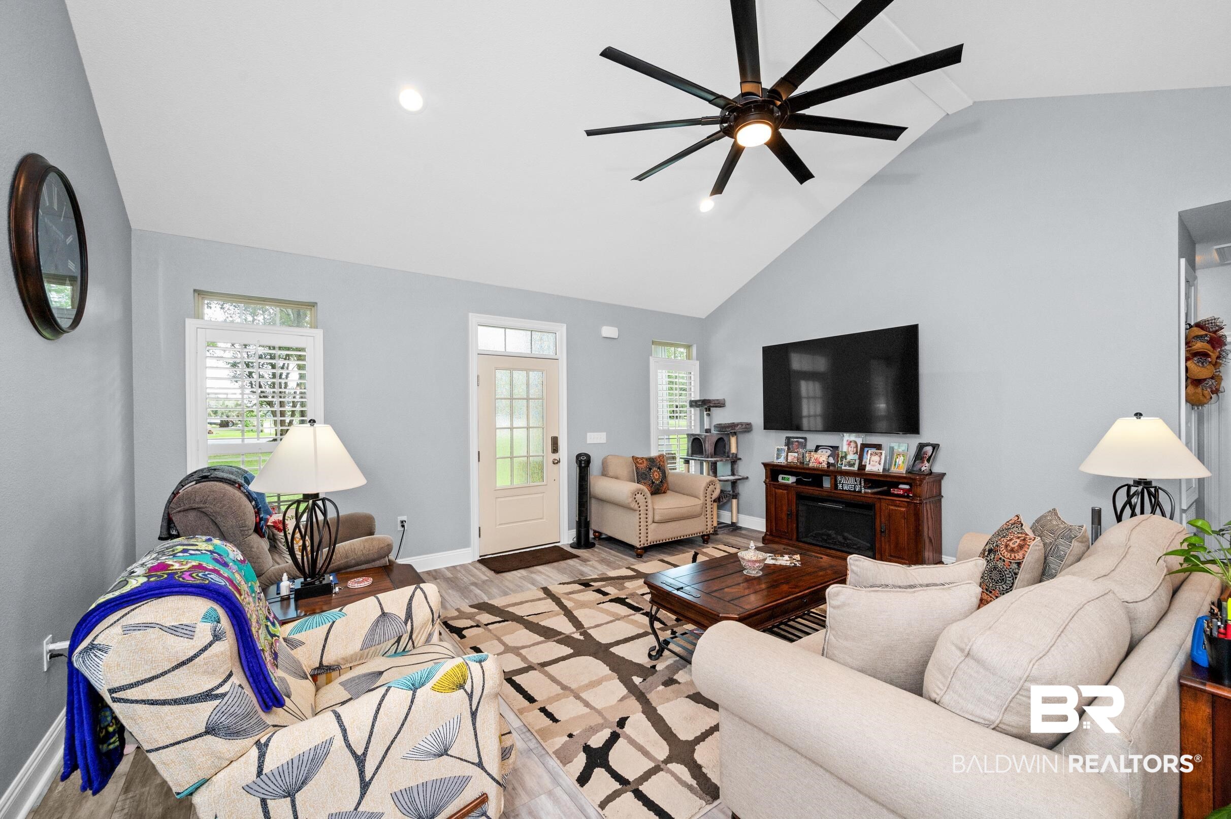 1700 South Juniper Street Foley, AL 36535 - Photo 10 of 51 Living room featuring light hardwood / wood-style flooring, ceiling fan, and high vaulted ceiling