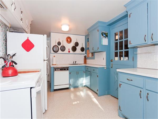 75 Lawson Road Winchester, MA 01890 - Photo 11 of 19 a kitchen with a refrigerator and a sink