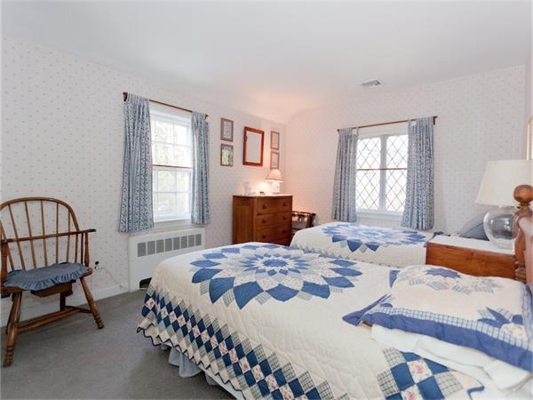 75 Lawson Road Winchester, MA 01890 - Photo 13 of 19 a bedroom with a bed and window