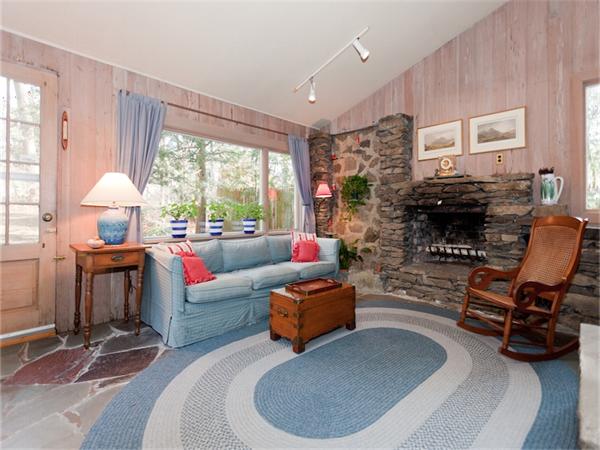 75 Lawson Road Winchester, MA 01890 - Photo 6 of 19 a living room with furniture and a fireplace