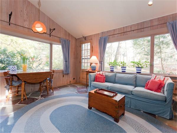 75 Lawson Road Winchester, MA 01890 - Photo 7 of 19 a living room with furniture and a large window