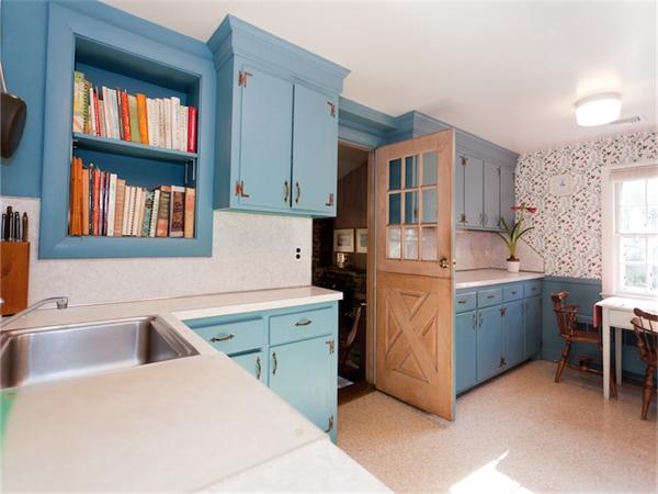 75 Lawson Road Winchester, MA 01890 - Photo 10 of 19 a kitchen that has a sink and a stove in it