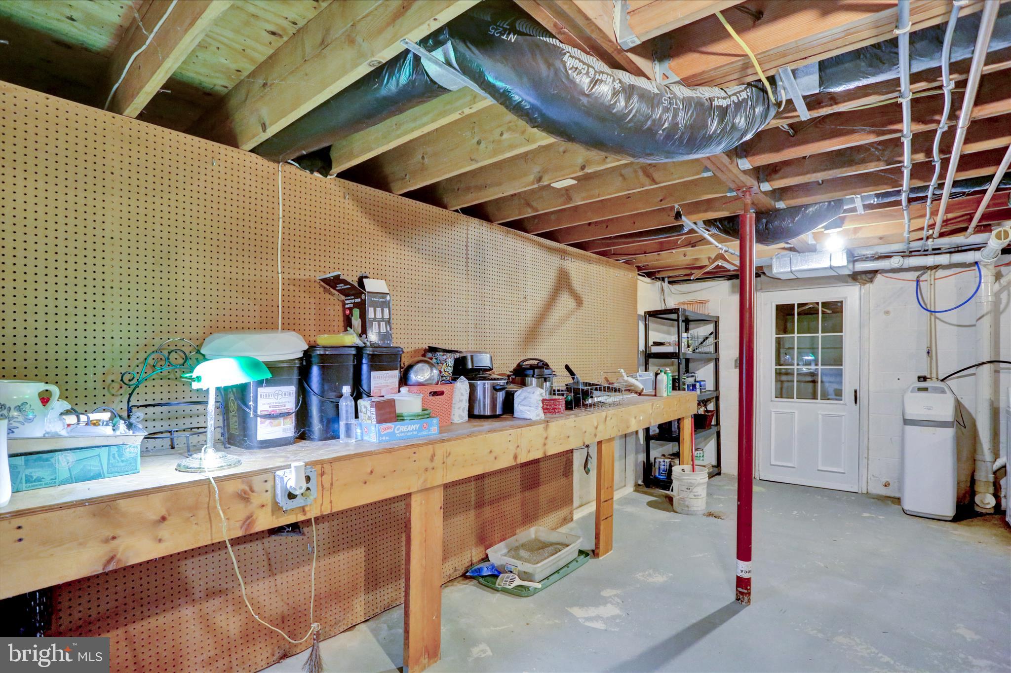 547 Seidels Run Road Leesport, PA 19533 - Photo 46 of 48 Bsmt workbench & exit door to outside