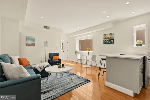 a living room with furniture and a table