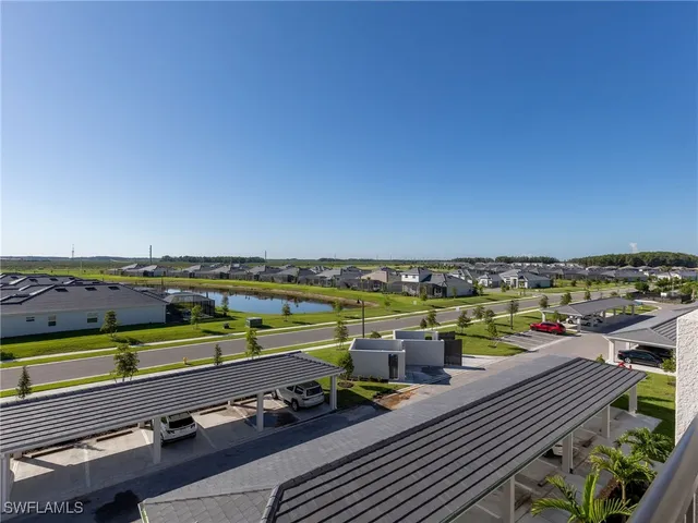 a kitchen with a stove a sink and a microwave